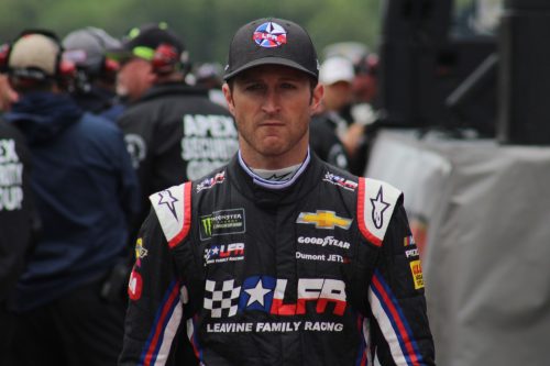 Kasey Kahne walks during driver introductions for the 2018 Pocono 400. (Tyler Head | The Racing Experts)