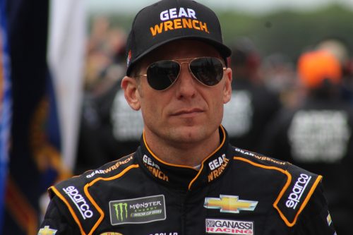 Jamie McMurray walks during driver introductions for the 2018 Pocono 400. (Tyler Head | The Racing Experts)